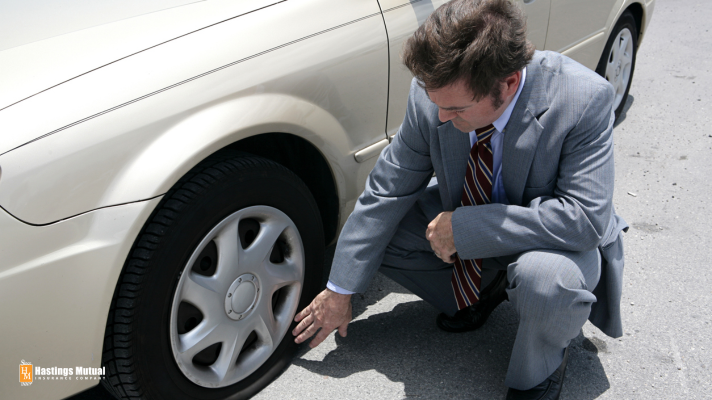 Flat tire businessman