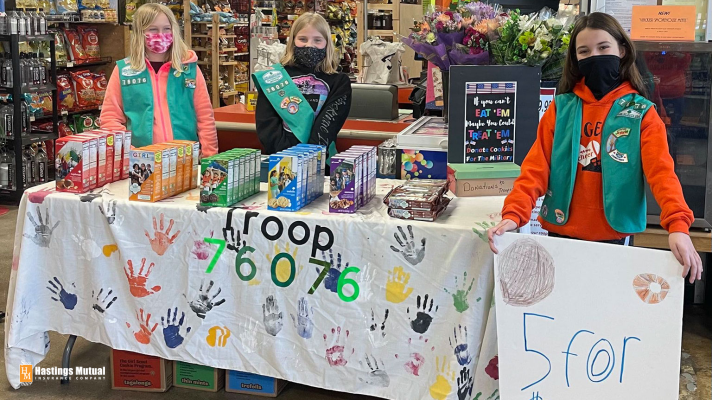 girl scouts selling cookies