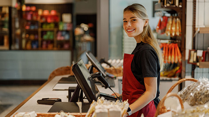 woman cashier smiling