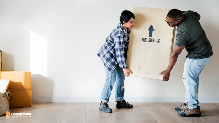 lifting a boxed painting