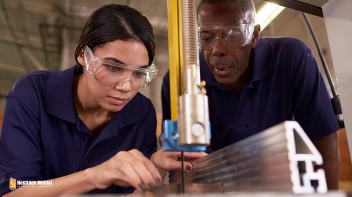 Young and older metalworkers