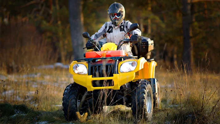 person riding an ATV