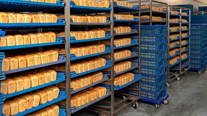 trays of bread in a commercial bakery
