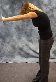person demonstrating the forward arm stretch described below