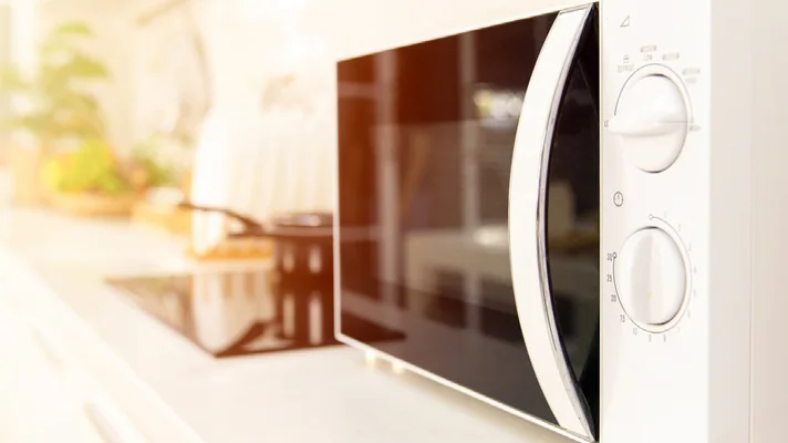 Close up of microwave on a counter