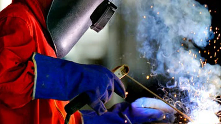 a person arc welding